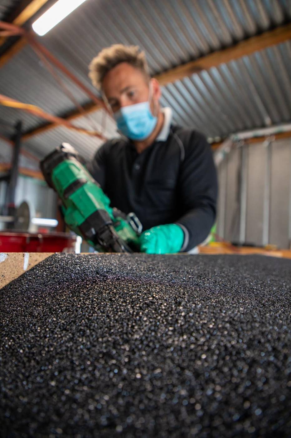 Rubber ramp manufacturing – Mentone workshop Ramps R Us technician building a recycled rubber ramp in the Mentone workshop